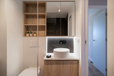 Design ideas for a small contemporary powder room in Alicante-Costa Blanca with white cabinets, white tile, ceramic tile, white walls, ceramic floors, a vessel sink and white benchtops.