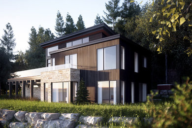 Design ideas for a contemporary two-storey exterior in Montreal with wood siding.