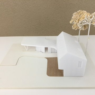 Haus unter Bäumen