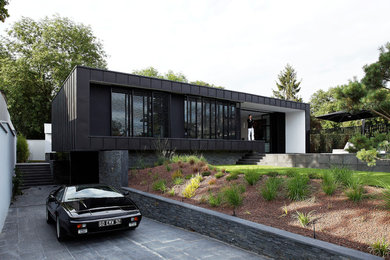 Cette photo montre une façade de maison tendance.