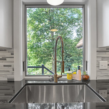 Absolute Black Kitchen with Waterfall Edge