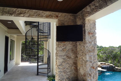 Patio - contemporary patio idea in Houston