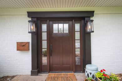 White one-story brick house exterior photo in Cincinnati with a shingle roof