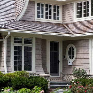 Cape Cod Stone and Shingle Style House with Covered Side Porch and Jewel Window