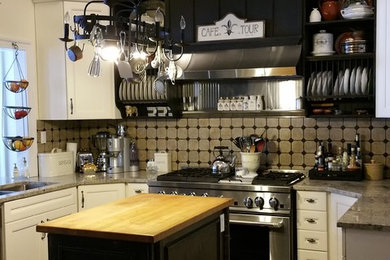 Example of a cottage kitchen design in Toronto
