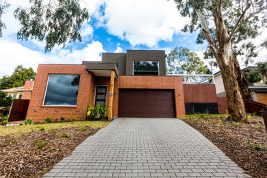 This is an example of an asian home design in Melbourne.