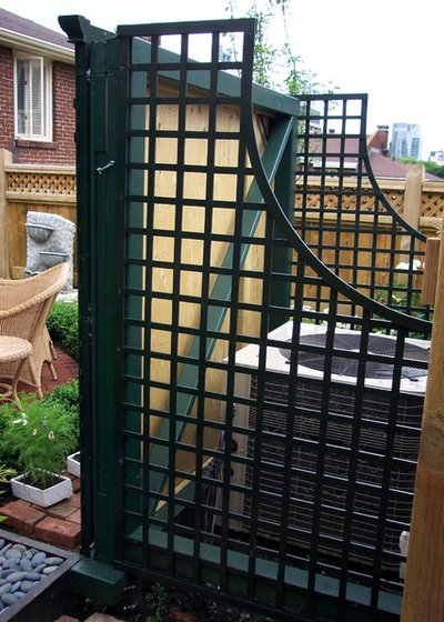 5 Ways to Hide That Big Air Conditioner in Your Yard