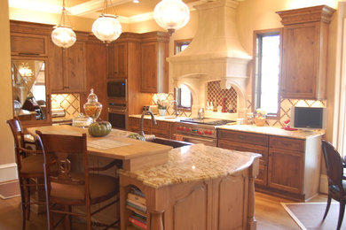 This is an example of a traditional kitchen in Raleigh.