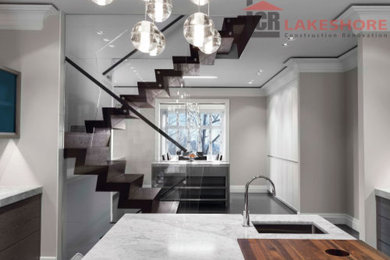 Example of a trendy staircase design in Montreal