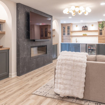 Warm & Inviting Basement Retreat with Custom Bar + Entertainment Center
