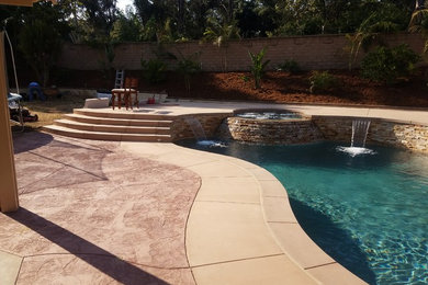 Inspiration for a transitional pool remodel in Orange County