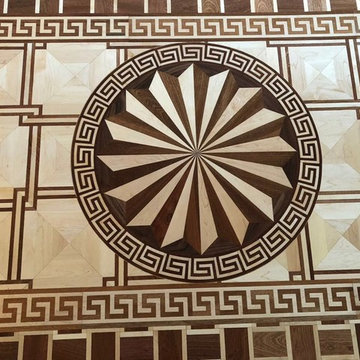 Decorative border frames the flooring much like a picture frame