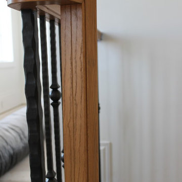White Oak Curved Stair With European Iron Balusters