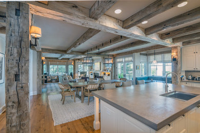 Great room - farmhouse medium tone wood floor and brown floor great room idea in Denver