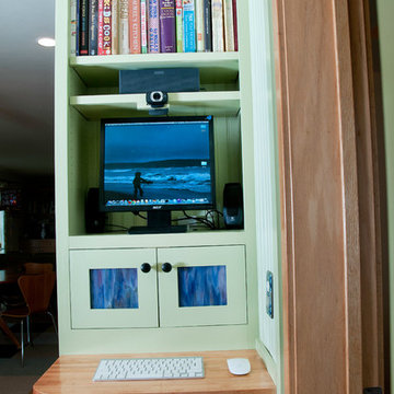 Space-saving computer work station and recipe center.