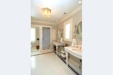 Example of a transitional bathroom design in Miami