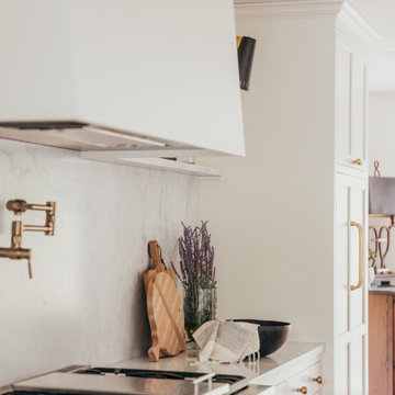 Lakeside Estates Modern Transitional Kitchen Utilizes White Paint with White Oak