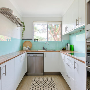 U Shaped Kitchen Design small contemporary u shaped separate kitchen in sydney with white cabinets wood benchtops