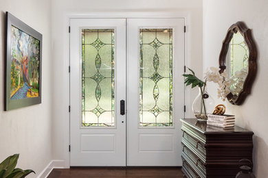 Inspiration for a tropical entryway remodel