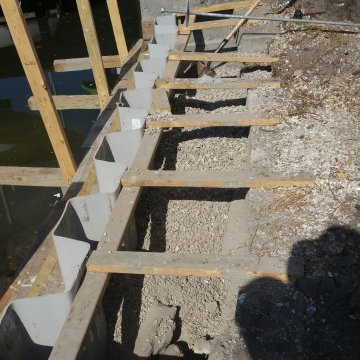 replacing a fallen seawall
