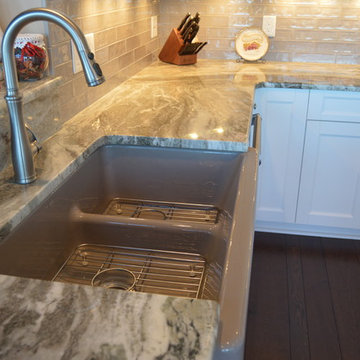 Kitchen Remodel with Dove White Cabinetry and Fantasy Brown Granite Tops