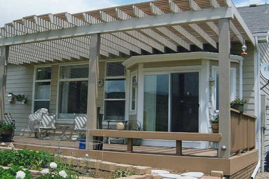 Deck - transitional backyard deck idea in Denver