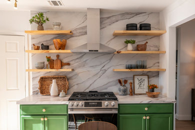Kitchen - large modern kitchen idea in New York with stainless steel appliances