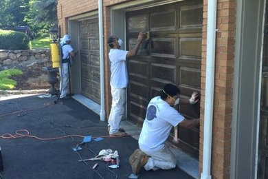 One of our teams at work on a garage door remodeling project