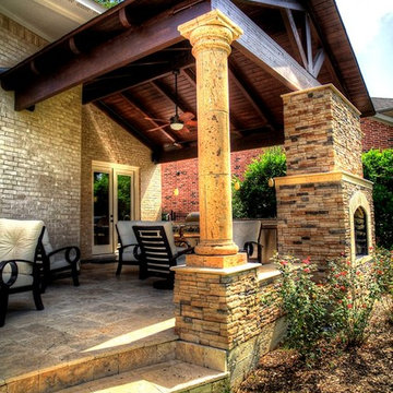 Grand home addition with outdoor kitchen see through fireplace - km