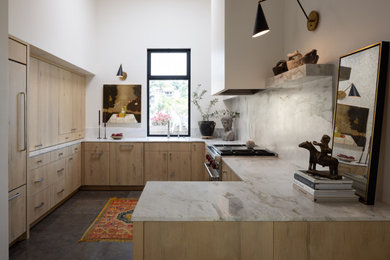 Example of a trendy kitchen design in San Diego with flat-panel cabinets