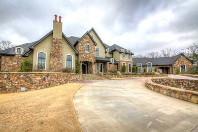 Example of a large mountain style home design design in Dallas