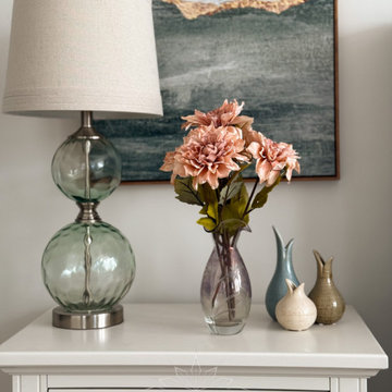 Coastal-Inspired Bedroom Retreat with Velvet Tufted Headboard and Accent Wall