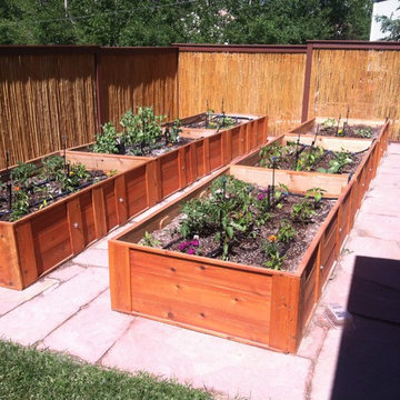 Raised bed, container garden with flagstone pathways