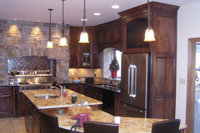 Mid-sized elegant l-shaped eat-in kitchen photo in Other with two islands