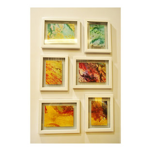 Ispirazione per una grande camera matrimoniale etnica con pareti beige e pavimento in gres porcellanato