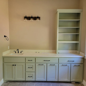 Sage Green Custom Vanity with Built-In Open Shelving Hutch
