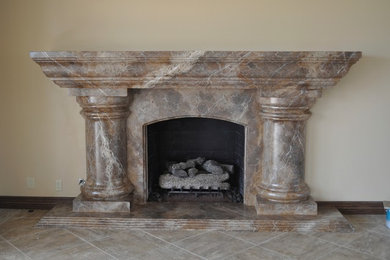 Inspiration for a mid-sized timeless ceramic tile living room remodel in Los Angeles with a stone fireplace