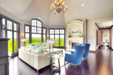 Living room - transitional formal dark wood floor living room idea in Other with a stone fireplace and no tv