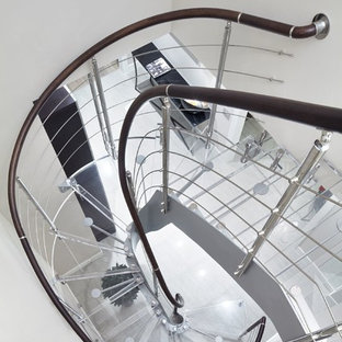 Mixed contemporary acrylic curved staircase in Moscow with open risers.