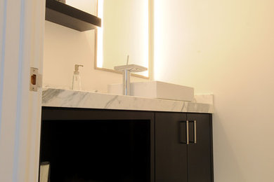 Inspiration for a contemporary powder room remodel in Salt Lake City