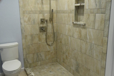 Mid-sized transitional master bathroom photo in Oklahoma City with shaker cabinets, distressed cabinets and granite countertops