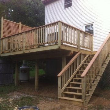 Presure treated deck with cedar cap rail and, privacy lattice