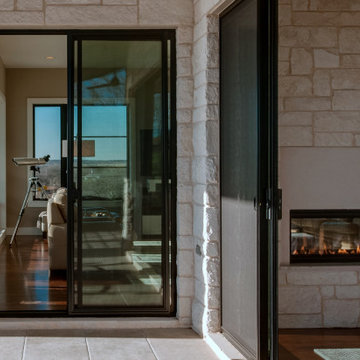 Milgard Black Fiberglass and Aluminum Windows and Doors - TX Lake House