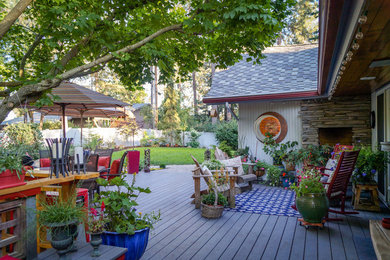 Inspiration for a mid-sized zen backyard deck container garden remodel in Other with no cover