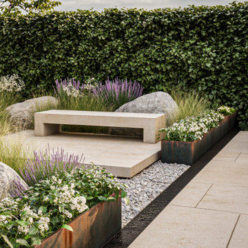 Contemporary Courtyard Garden with Stone Bench and Corten Planters