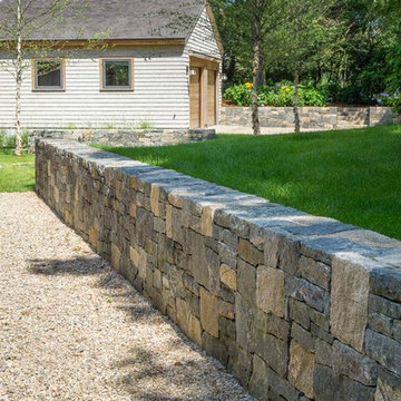 Granite Retaining Wall and Gravel Walkway Landscape Design
