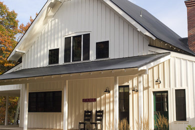 Example of a cottage exterior home design in Philadelphia