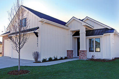 Mid-sized transitional white one-story mixed siding gable roof idea in Boise