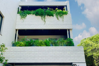 東京都下にあるトラディショナルスタイルのおしゃれな家の外観の写真