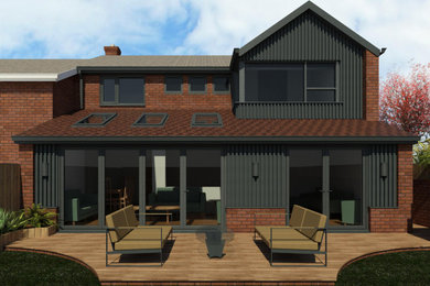 Imagen de fachada de casa bifamiliar gris y marrón clásica de tamaño medio de dos plantas con revestimiento de madera, tejado a dos aguas, tejado de teja de barro y panel y listón